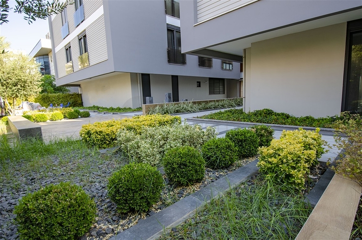 Элитный проект на первой береговой линии в районе Лара Анталья