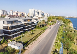 Элитный проект на первой береговой линии в районе Лара Анталья