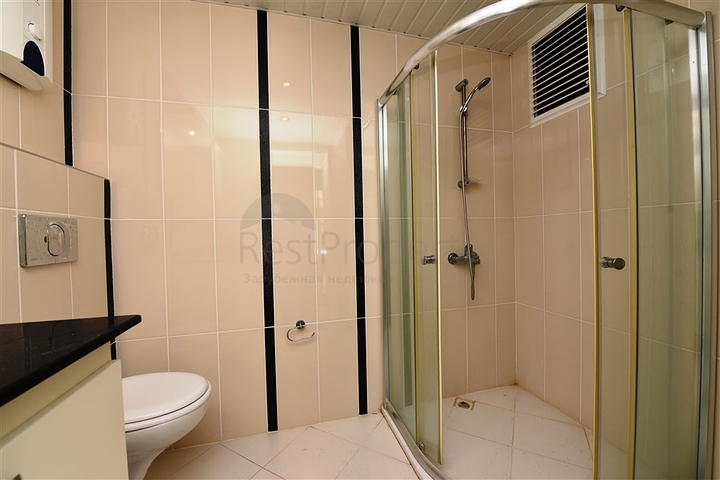 Просторная квартира в центре района Махмутлар