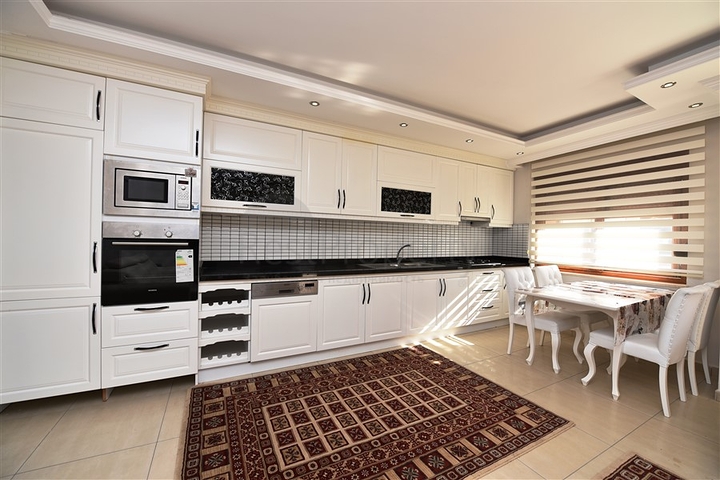 Просторная квартира в центре района Махмутлар