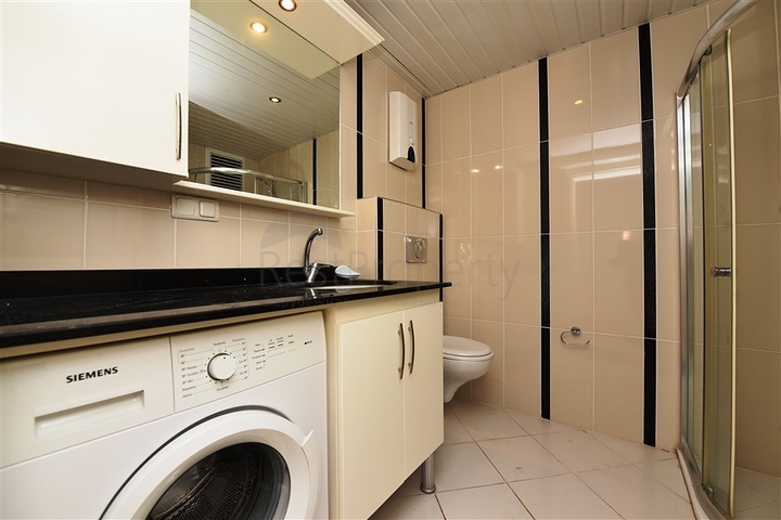 Просторная квартира в центре района Махмутлар