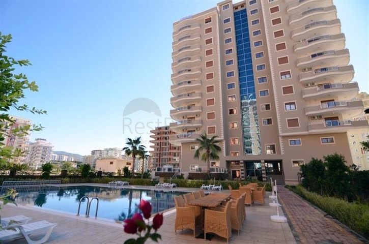 Просторная квартира в центре района Махмутлар