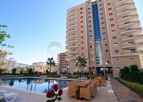 Просторная квартира в центре района Махмутлар