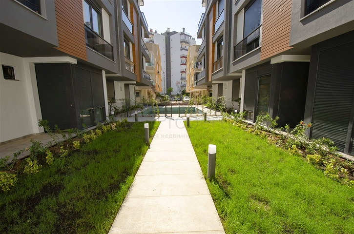 Квартиры 1+1, 2+1, 3+1 в комплексе в районе Гюзельоба Лара 