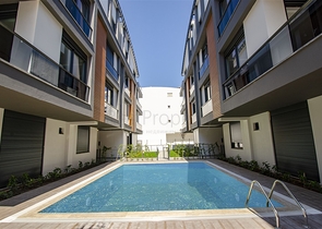 Квартиры 1+1, 2+1, 3+1 в комплексе в районе Гюзельоба Лара 