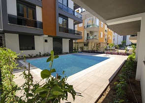 Квартиры 1+1, 2+1, 3+1 в комплексе в районе Гюзельоба Лара 