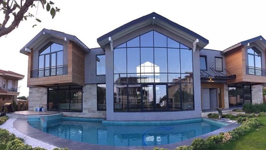 Люкс вилла 9+1 с садом в районе Дошемеальты Анталья