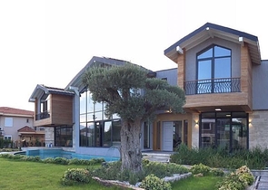 Люкс вилла 9+1 с садом в районе Дошемеальты Анталья