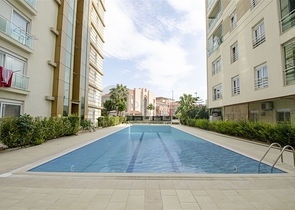 Квартира 1+1 с мебелью рядом с русской школой в Анталии