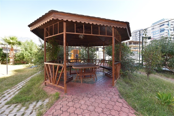 Квартира с мебелью и видом на сад в Махмутларе