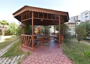 Квартира с мебелью и видом на сад в Махмутларе