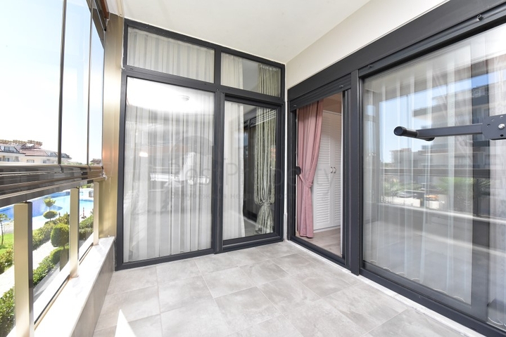 Квартира с выходом в сад в районе Аланьи Оба