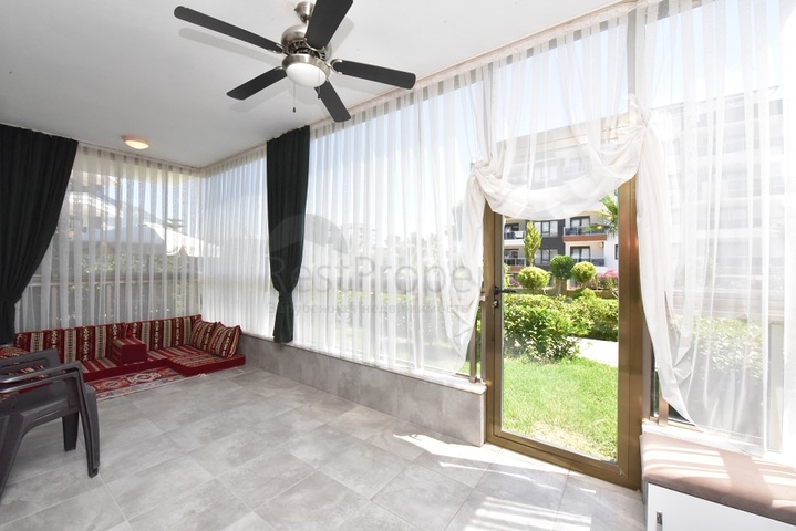 Квартира с выходом в сад в районе Аланьи Оба