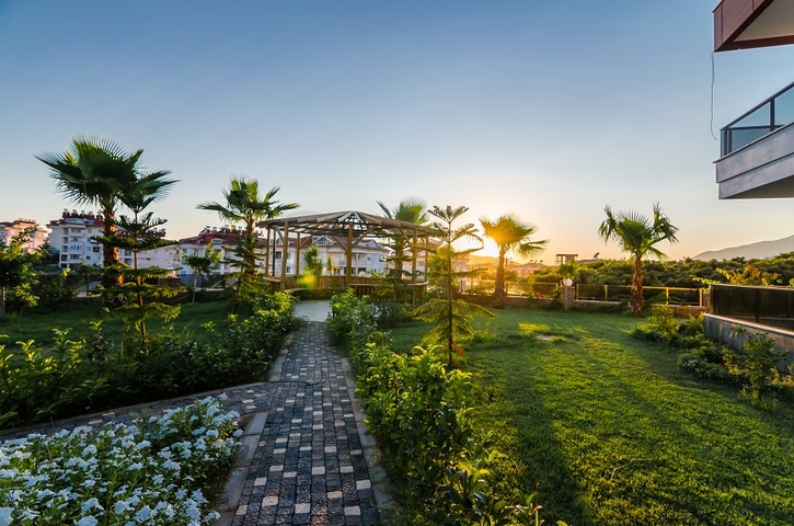 Квартира с выходом в сад в районе Аланьи Оба