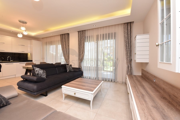 Квартира с выходом в сад в районе Аланьи Оба