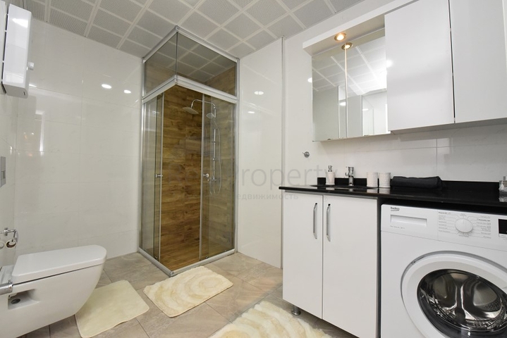 Квартира с выходом в сад в районе Аланьи Оба