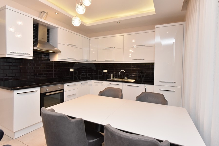 Квартира с выходом в сад в районе Аланьи Оба