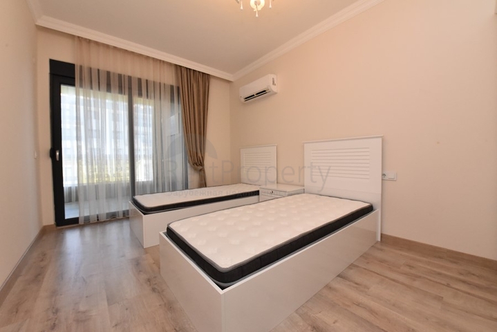 Квартира с выходом в сад в районе Аланьи Оба