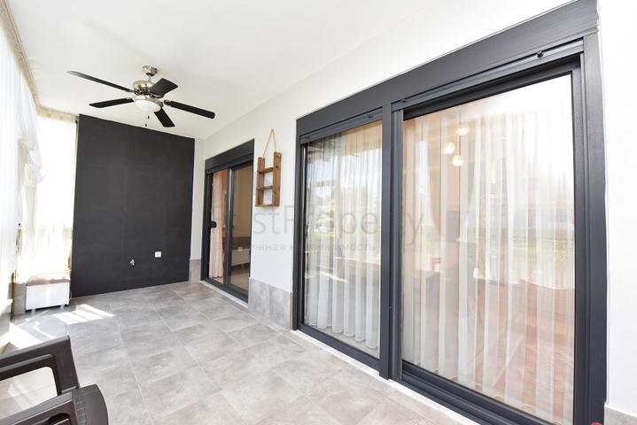 Квартира с выходом в сад в районе Аланьи Оба