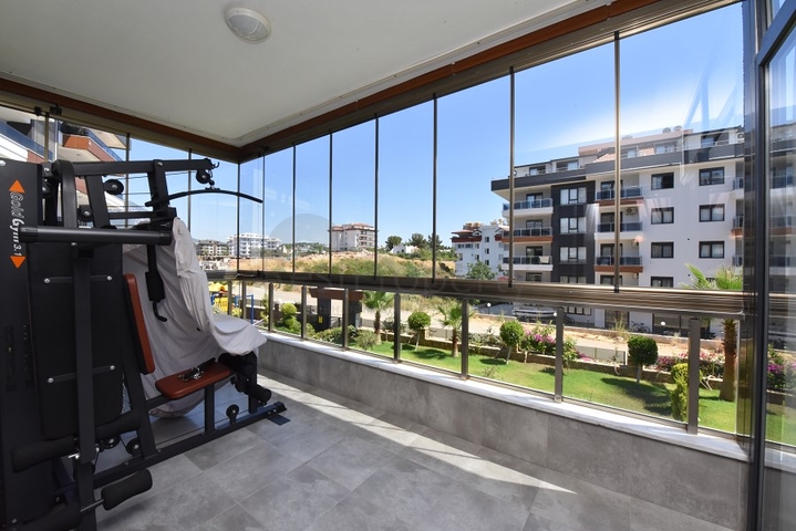 Квартира с выходом в сад в районе Аланьи Оба