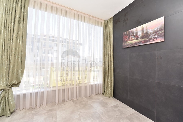 Квартира с выходом в сад в районе Аланьи Оба