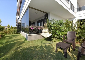 Квартира с выходом в сад в районе Аланьи Оба