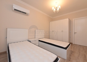 Квартира с выходом в сад в районе Аланьи Оба