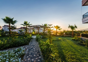 Квартира с выходом в сад в районе Аланьи Оба