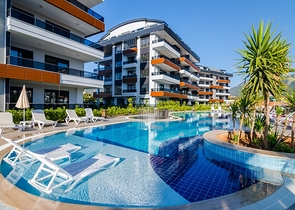 Квартира с выходом в сад в районе Аланьи Оба