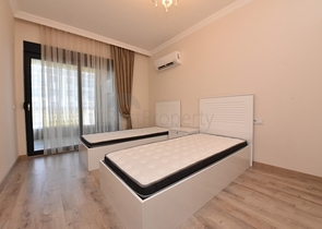 Квартира с выходом в сад в районе Аланьи Оба