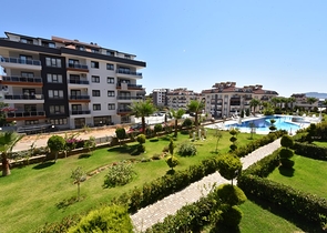 Квартира с выходом в сад в районе Аланьи Оба