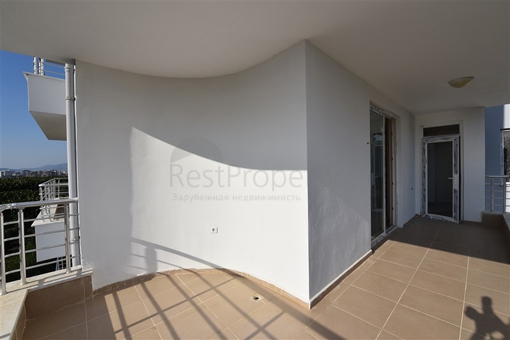 Трехкомнатная квартира в районе Махмутлар