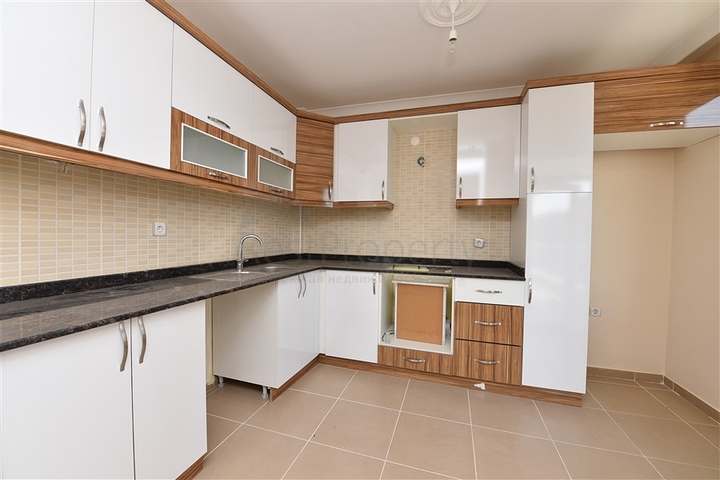 Трехкомнатная квартира в районе Махмутлар