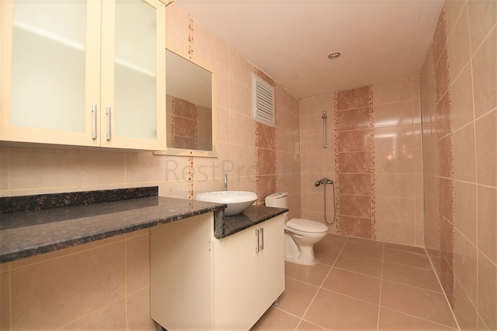 Трехкомнатная квартира в районе Махмутлар