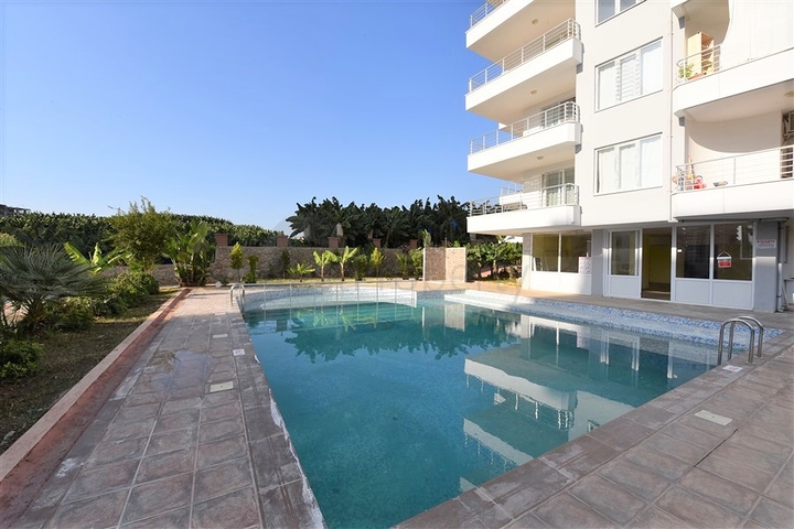 Трехкомнатная квартира в районе Махмутлар