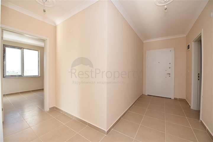 Трехкомнатная квартира в районе Махмутлар