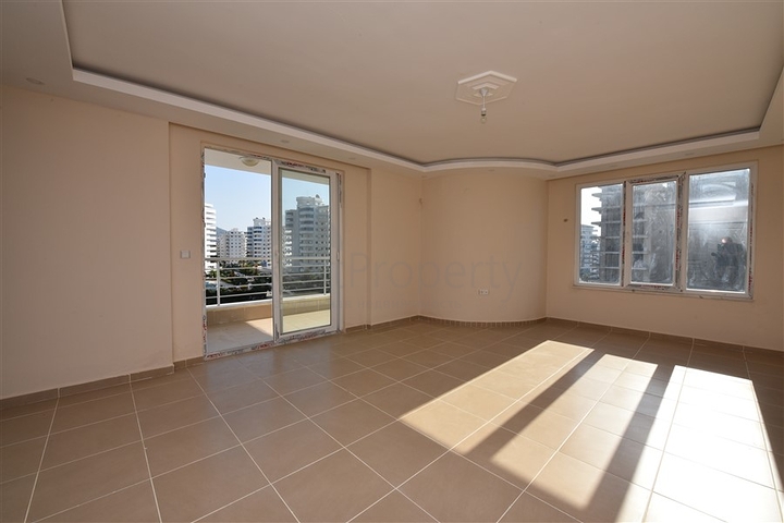 Трехкомнатная квартира в районе Махмутлар