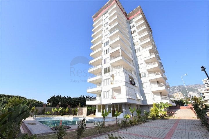 Трехкомнатная квартира в районе Махмутлар