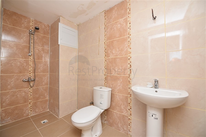 Трехкомнатная квартира в районе Махмутлар