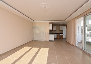 Трехкомнатная квартира в районе Махмутлар