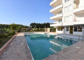 Трехкомнатная квартира в районе Махмутлар