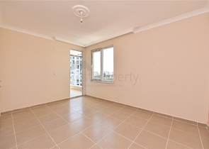 Трехкомнатная квартира в районе Махмутлар