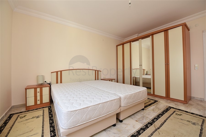 Меблированная квартира с двумя спальнями в Махмутларе 