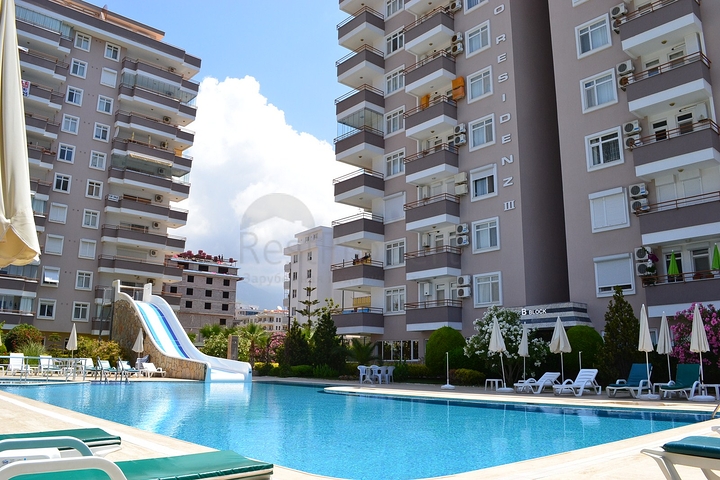 Меблированная квартира с двумя спальнями в Махмутларе 