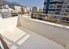 Меблированная квартира с двумя спальнями в Махмутларе 