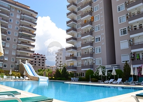 Меблированная квартира с двумя спальнями в Махмутларе 