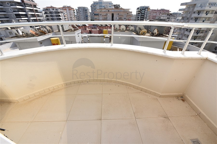 Трехкомнатная квартира в районе Махмутлар