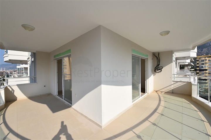 Трехкомнатная квартира в районе Махмутлар