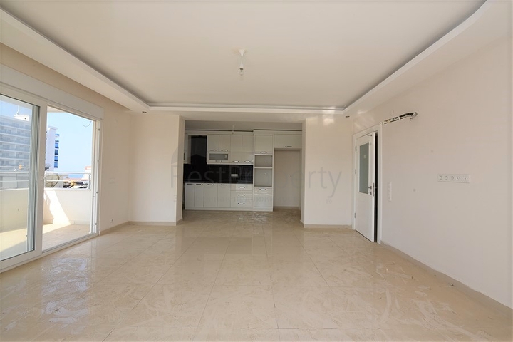 Трехкомнатная квартира в районе Махмутлар