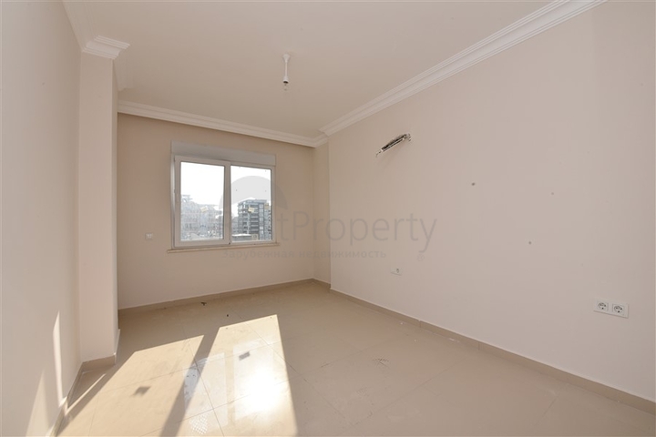 Трехкомнатная квартира в районе Махмутлар